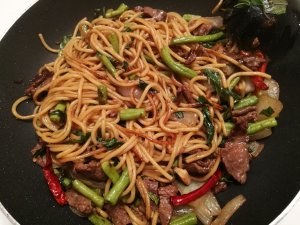 Stir Fried spaghetti beef and Holy Basil leaves